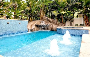 Heated Pool, Hot tub, waterslide, waterfall, bubblers, and baja shelf