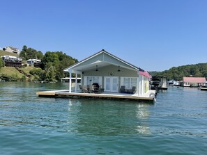 Come relax on our beautiful porch and watch the boats go by.