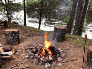 Bonfire pit with log chairs (adirondack chairs also available).