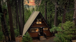 Charming A-frame cabin surrounded by majestic trees, the perfect hideaway year round