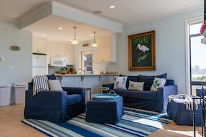 Living room with ocean, river and valley views toward Monterey.