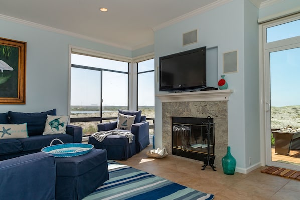 Living room with ocean, river and valley views toward Monterey.