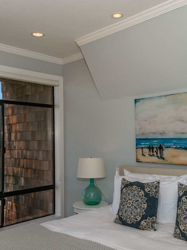 Master bedroom with king, master bathroom and ocean views.