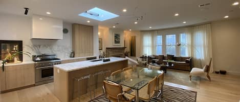 Expansive open plan kitchen, dining and living space