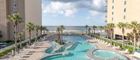 EXCLUSIVE CRYSTAL TOWER AMENITY PACKAGE w/ GULF FRONT OUTDOOR POOL OASIS! LAZY RIVER • ZERO ENTRY • HOT TUB • SUNNING DECK & LOUNGERS