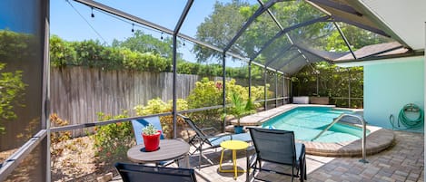 Heated pool and outdoor furniture, all screened-in so no bugs!