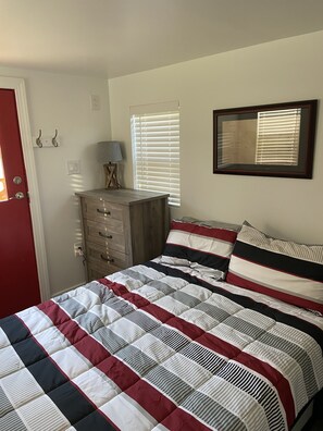 Full size bed in bedroom area