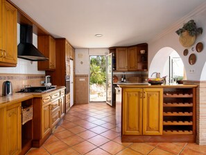 Furniture, Building, Table, Plant, Chair, Houseplant, Shade, Orange, Interior Design, Flooring
