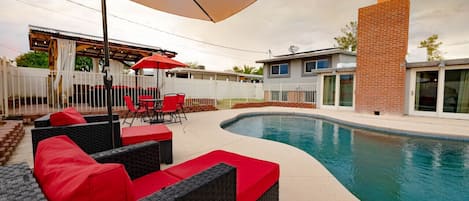 Take a dip in the pool, enjoy the shaded seating under the pergola and catch an amazing sunset by the outdoor fire pit