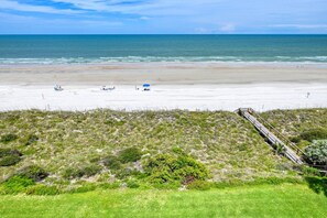 The beach is right outside the condo!