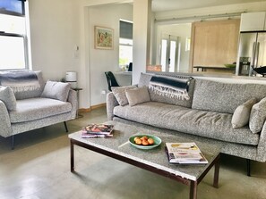 Open floor plan living room. Firetick TV for viewing.