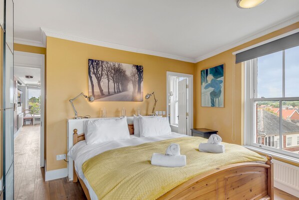 In the master bedroom, you have a Super King size bed, large windows for natural light and amazing penthouse city views.

Linen & towels are provided. You also have a private ensuite with a large walk-in shower and B-day. 