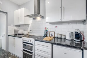 Prepare delicious meals in this fully-equipped kitchen.