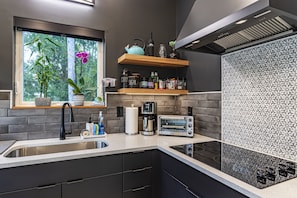 Kitchen. Cooktop Stove, No Oven.
