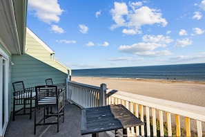 High top tables and chairs for great beach views.
