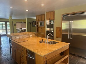 Gourmet kitchen with double oven, rangetop, 2 sinks and plenty of countertops!