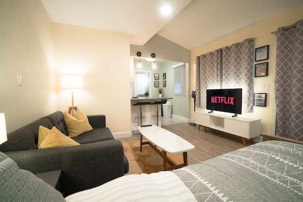 Your own private suite with kitchenette, bathroom, queen bed, and smart TV.
