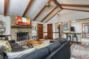 Curl up on the couch for some TV or Cozy Fire in the Stone Fireplace or both.