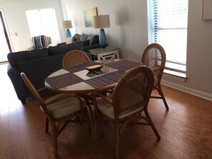 Full dining room table with extra seating available for family dinners
