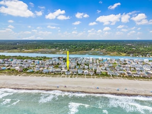 Just walk out your back door and jump into the sand, beach, and fun.