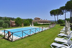 The property surrounding by greenery and the sharing pool