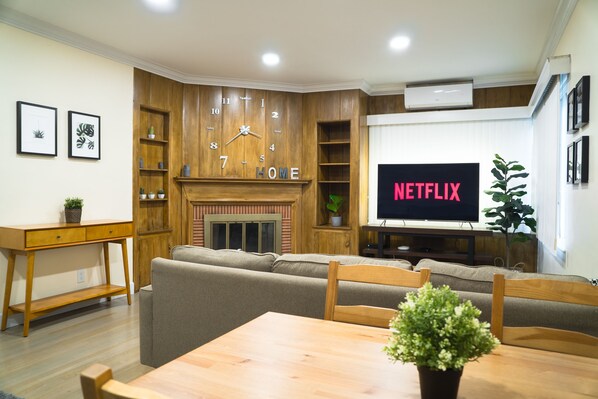 Well-lit room with AC & heater. Smart TV w/ backlight. It's a place call home!