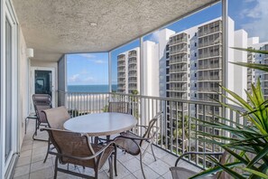 Enjoy the spacious screen enclosed balcony with partial gulf views!