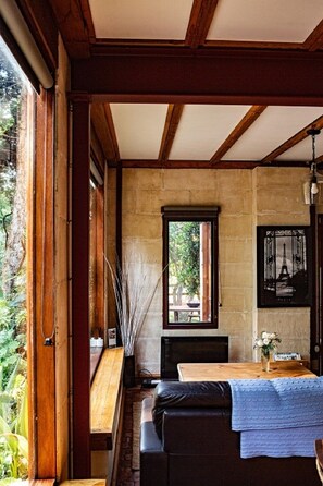 Large open living space with lounge and dining areas