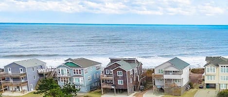 The beach access with a wooden walkway is located directly across the street!