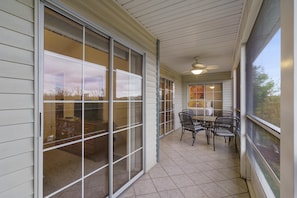 Screened in Balcony with seating for 4