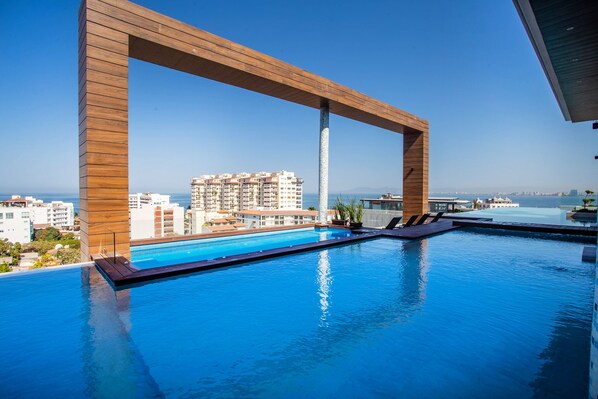 Infinity pool with breathtaking views of the city and ocean