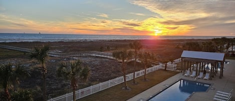 On Beach Time Sunset over Gulf and Communal Pool from Balcony