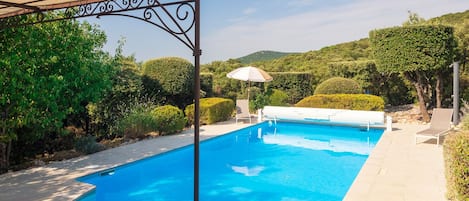 Heated pool with porcelain tiled surround and gorgeous unspoiled views
