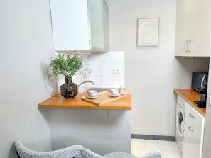 Open kitchen with amenities during your stay