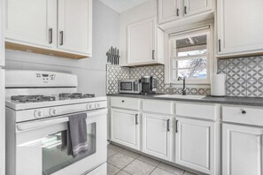 We have stocked the kitchen with all the utensils and kitchenware one may need. We also have a refrigerator, microwave, stove, coffee maker, and many other items!