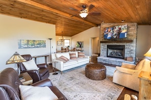 Pleasing Furnishings and All Wood Ceilings in the Living Room