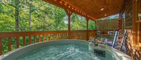 Relax among the treetops in your own private hot tub.