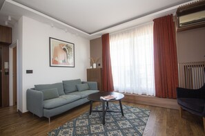 The sofa in the living room is good for a nap if not taller than 180cm.