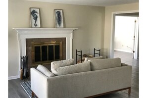 Living room: firewood and fire starters provided.