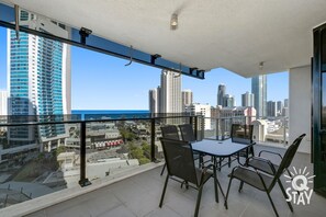 The picturesque city view with the ocean as the backdrop from the balcony😻