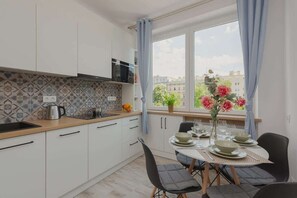 The kitchen's modern appliances make meal preparation easy.