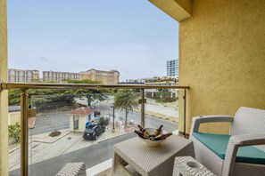 Spend time reading your books or just drinking your cold beer on this private balcony.
