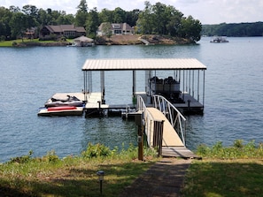 Dock has open slip and kayak for guest use.