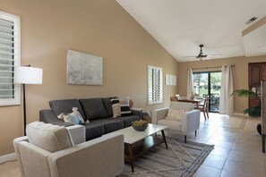 Spacious modern family room / dining area with direct access to the patio. 