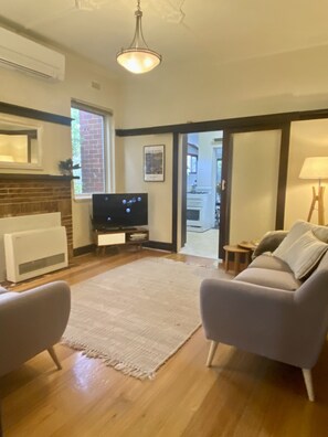 Loungeroom looking to kitchen