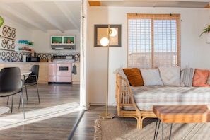 Modern Kitchen with Vintage Appliances and Dining Table with Seating for 4.