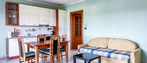 Living room/Kitchen MYHOUSE INN TORINO -Solo Affitti Brevi