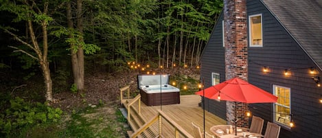 Relax in our 6-person 100 jet hot tub, or dine al fresco on our deck