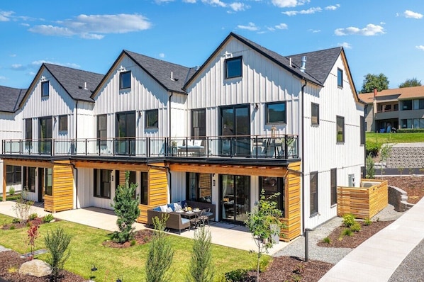 This is it!  Lakside Luxury is the end unit of a Canopy home in the brand new Ponderosa development on Wapato Point.  It boasts a lovely patio, as well as a spacious lake view deck off the bedroom upstairs.