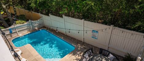 Backyard pool (heated) --  convenient and perfect for cooling off in the summer heat.
